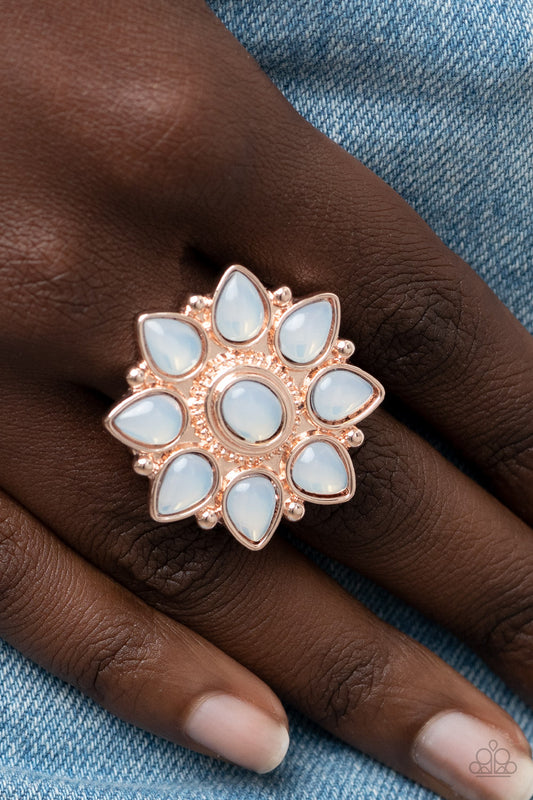 Enchanted Orchard Rose Gold Ring - Paparazzi Accessories  Dewy opal teardrop beads bloom from a matching oval beaded center, resulting in an ethereal floral pattern atop a studded rose gold backdrop. Features a stretchy band for a flexible fit.  Sold as one individual ring.