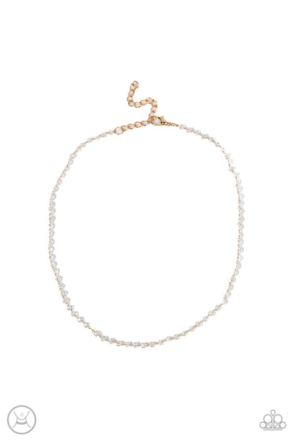 Mini MVP Gold Choker Necklace - Paparazzi Accessories  A dainty row of faceted white crystal-like beads delicately links around the neck, resulting in a golden glimmer. Features an adjustable clasp closure.  Sold as one individual choker necklace. Includes one pair of matching earrings.