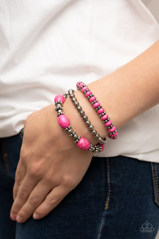 Take by SANDSTORM Pink Bracelet - Paparazzi Accessories  Infused with the vivacious allure of pink stone beads, antiqued silver beads and studded accents are threaded along stretchy bands, creating a stack of artisan-inspired flair.  Sold as one set of three bracelets.
