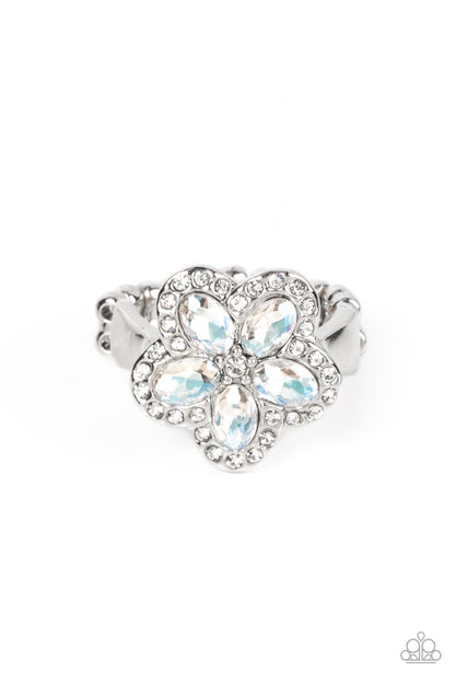 Efflorescent Envy White Ring - Paparazzi Accessories  Bordered in glassy white rhinestones, white oval rhinestones bloom into an enchanting floral centerpiece atop the finger. Features a dainty stretchy band for a flexible fit.  Sold as one individual ring.
