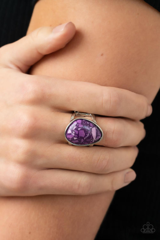 Earth Hearth Purple Ring - Paparazzi Accessories  Featuring a faux terrazzo finish, an asymmetrical purple stone is encased in a sleek silver frame atop layered silver bands for an earthy inspiration. Features a stretchy band for a flexible fit.  Sold as one individual ring.