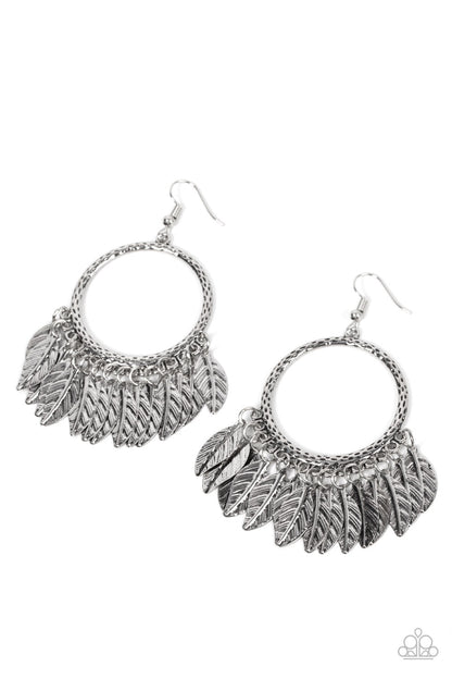 FOWL Tempered Silver Feather Earring - Paparazzi Accessories  Embossed silver feathers dance from the bottom of a hammered silver hoop, resulting into a free-spirited fringe. Earring attaches to a standard fishhook fitting.  Sold as one pair of earrings.