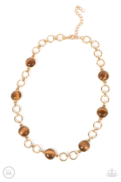 Dreamy Distractions Brown Choker Necklace - Paparazzi Accessories  Pairs of gold hoops and brown cat's eye dotted gold frames delicately link around the neck, creating a dreamy glow. Features an adjustable clasp closure.  Sold as one individual choker necklace. Includes one pair of matching earrings.