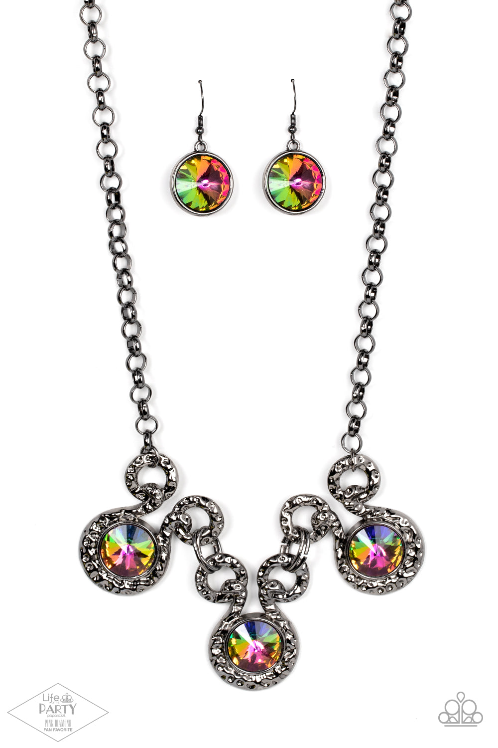 Hypnotized Multi Necklace - Paparazzi Accessories  Three dramatically oversized oil spill rhinestones are nestled into three textured gunmetal fittings that are connected by oval gunmetal rings, creating a brilliant statement piece. Features an adjustable clasp closure.  Sold as one individual necklace. Includes one pair of matching earrings. This Fan Favorite is back in the spotlight at the request of our 2021 Life of the Party member with Pink Diamond Access, NaKisha M.
