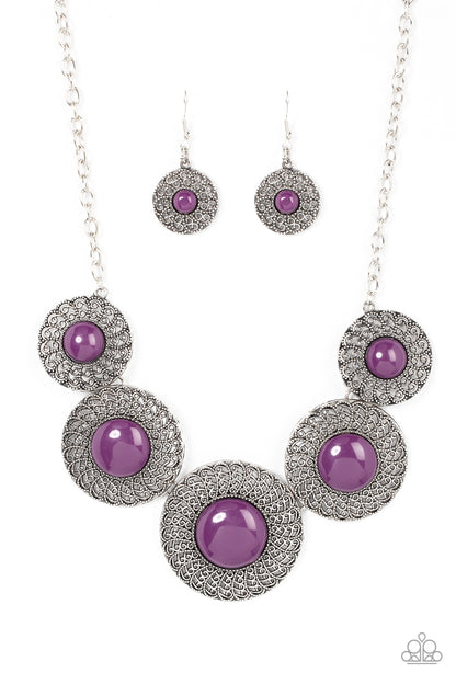 Detail Orientated Purple Necklace - Paparazzi Accessories  Dotted with bubbly plum beads, silver discs spinning with swirly petal motifs gradually increase in size as they link below the collar for a statement-making floral fashion. Features an adjustable clasp closure.  Sold as one individual necklace. Includes one pair of matching earrings.