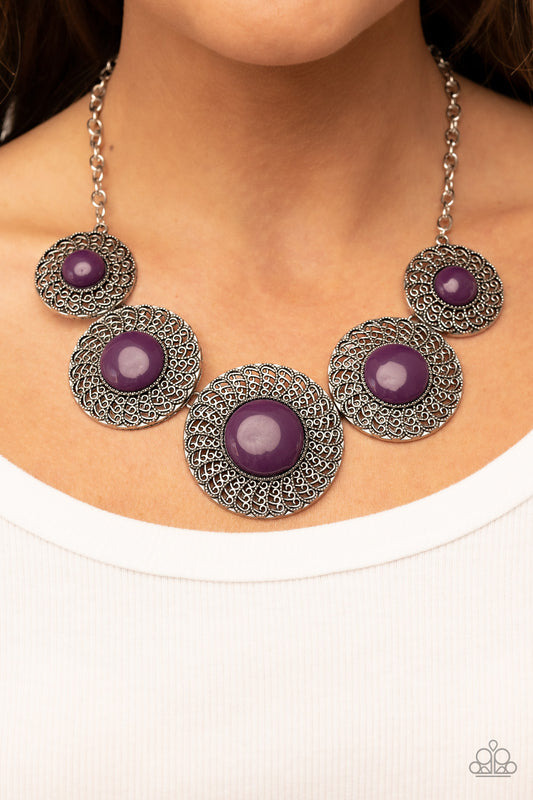 Detail Orientated Purple Necklace - Paparazzi Accessories  Dotted with bubbly plum beads, silver discs spinning with swirly petal motifs gradually increase in size as they link below the collar for a statement-making floral fashion. Features an adjustable clasp closure.  Sold as one individual necklace. Includes one pair of matching earrings.