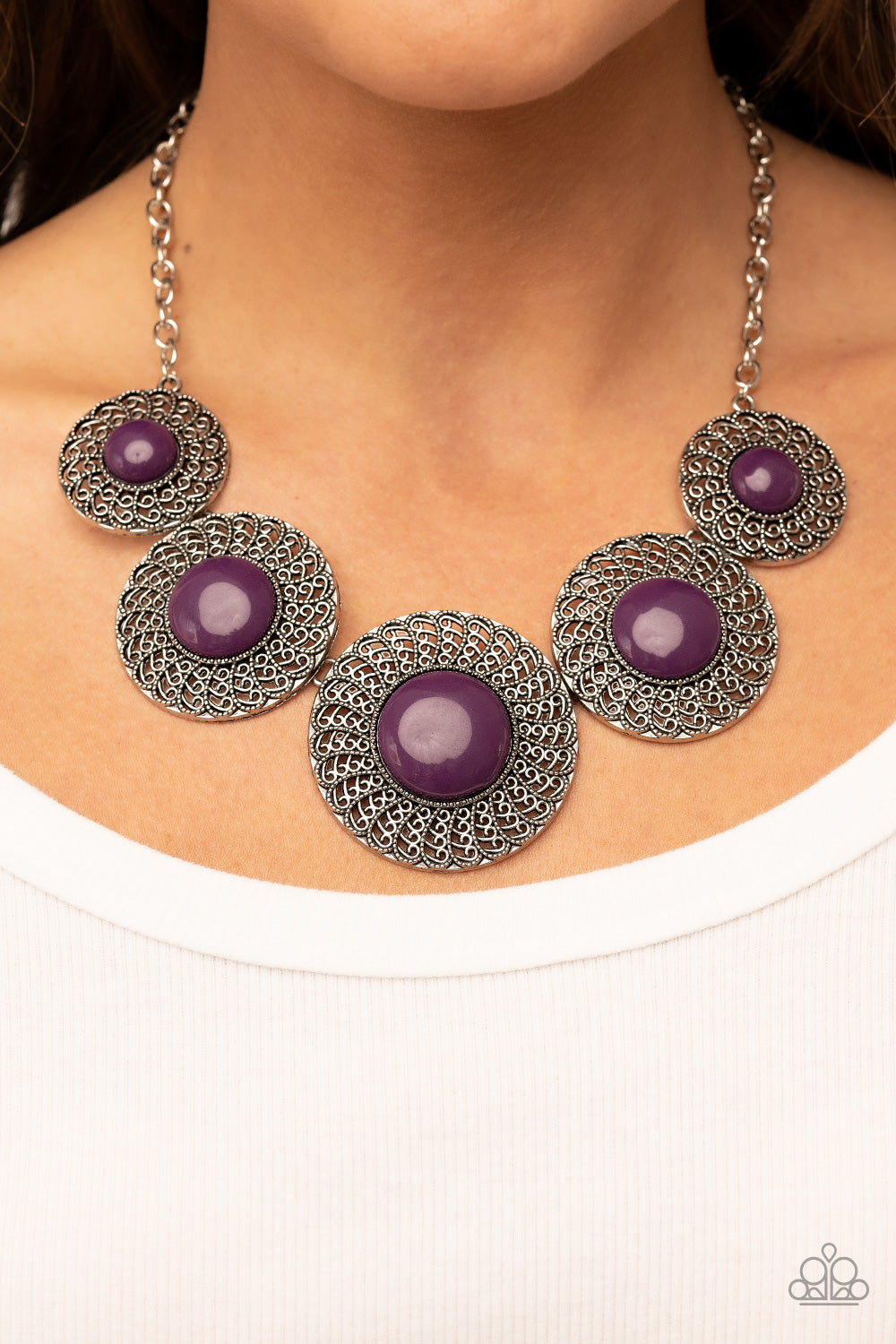 Detail Orientated Purple Necklace - Paparazzi Accessories  Dotted with bubbly plum beads, silver discs spinning with swirly petal motifs gradually increase in size as they link below the collar for a statement-making floral fashion. Features an adjustable clasp closure.  Sold as one individual necklace. Includes one pair of matching earrings.