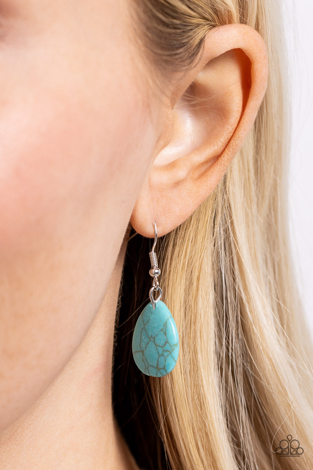 Rodeo Royale Turquoise Necklace - Paparazzi Accessories  An oversized turquoise stone is encased in a silver frame made up of layers of rope-like texture and topped with an antiqued silver adornment stamped in rustic patterns. The refreshing pendant swings from a hammered silver ring and clasp at the bottom of a lengthened silver chain, resulting in a captivating finish. Features an adjustable clasp closure.  Sold as one individual necklace. Includes one pair of matching earrings.  SKU: P2ST-BLXX-185XX