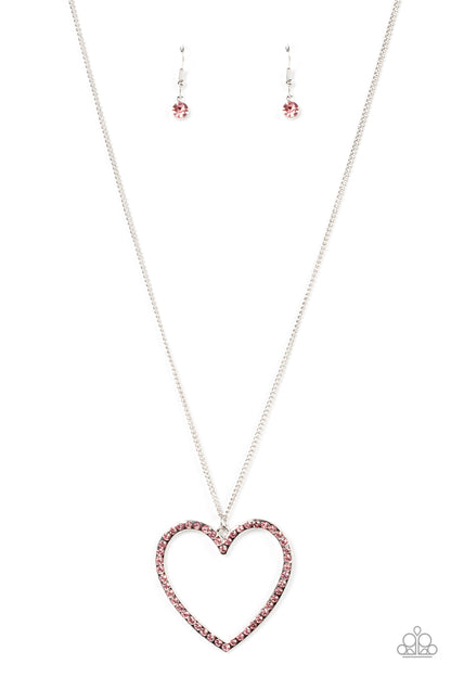 Va-Va-VALENTINE Pink Necklace - Paparazzi Accessories  An oversized silver heart frame is embellished with Pale Rosette rhinestones, resulting in a flirtatious pendant at the bottom of an extended silver chain. Features an adjustable clasp closure.  Sold as one individual necklace. Includes one pair of matching earrings.