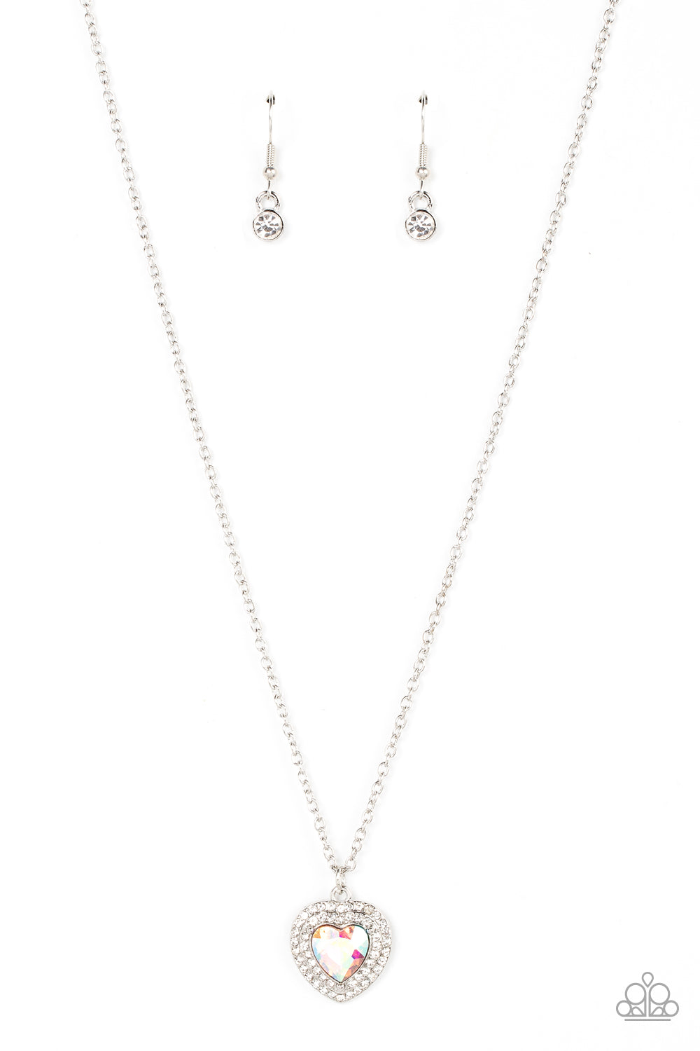 Taken with Twinkle Multi Necklace - Paparazzi Accessories  Bordered in stacked rows of glassy white rhinestones, a twinkly iridescent heart shaped gem sparkles at the center of a dainty silver chain for a flirtatious fashion. Features an adjustable clasp closure.  Sold as one individual necklace. Includes one pair of matching earrings.