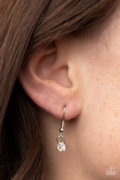 True Love Trinket Pink Necklace & Bracelet Set - Paparazzi Accessories A pink rhinestone heart charm dances from a strand of white and pink rhinestones, resulting in a flirtatious sparkle below the collar and around the wrist. Sold as one individual necklace. Includes one matching bracelet. Get The Complete Look! Bracelet: "Truly Lovely - Pink"