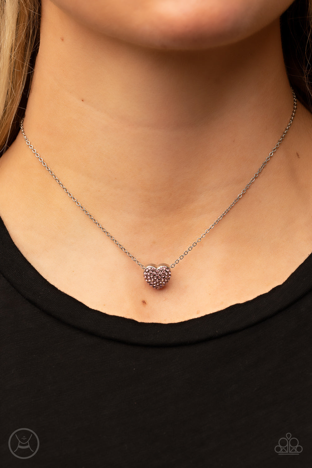 Twitterpated Twinkle Pink Necklace - Paparazzi Accessories  Encrusted in glassy pink rhinestones, a dainty heart frame sparkles along a dainty silver chain around the neck for a flirty finesse. Features an adjustable clasp closure.  Sold as one individual choker necklace. Includes one pair of matching earrings.