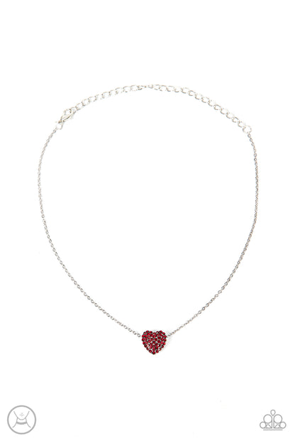 Twitterpated Twinkle Red Necklace - Paparazzi Accessories  Encrusted in fiery red rhinestones, a dainty heart frame sparkles along a dainty silver chain around the neck for a flirty finesse. Features an adjustable clasp closure.  Sold as one individual choker necklace. Includes one pair of matching earrings.