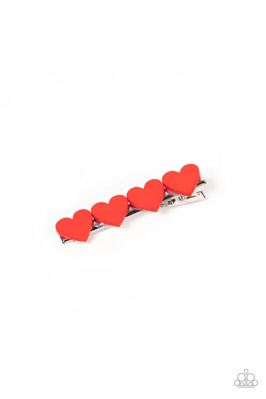 Sending You Love Red Hair Clip - Paparazzi Accessories  Rows of red wooden heart frames embellish the front of a silver frame, resulting in a flirtatious clip. Features a standard hair clip on the back.  Sold as one individual hair clip.