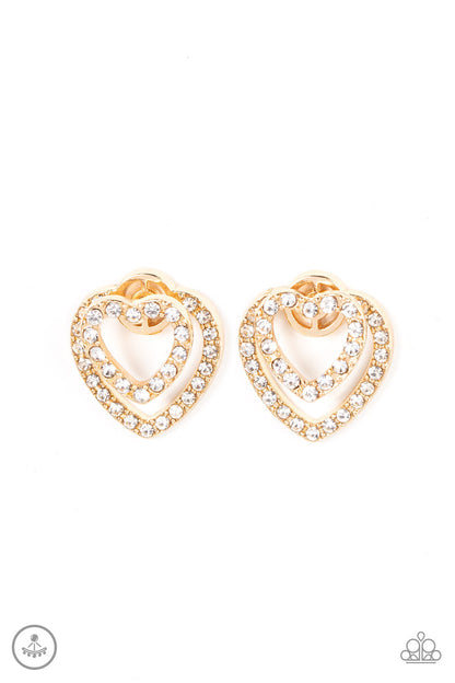 Ever Enamored Gold Jacket Earring - Paparazzi Accessories  A dainty gold heart dotted in glassy white rhinestones flirtatiously attaches to a double-sided post, while a slightly larger white rhinestone encrusted gold heart peeks out beneath the ear for a romantic finish. Earring attaches to a standard post fitting.  Sold as one pair of double-sided post earrings.