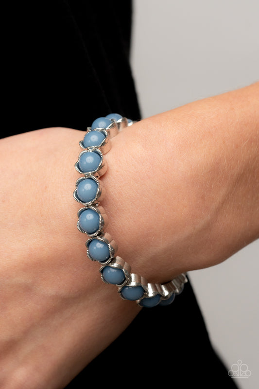Lets be Buds Blue Bracelet - Paparazzi Accessories  Textured silver petals fold around dewy Spring Lake beads along stretchy bands, resulting in a flowery pop of color around the wrist.  Sold as one individual bracelet.