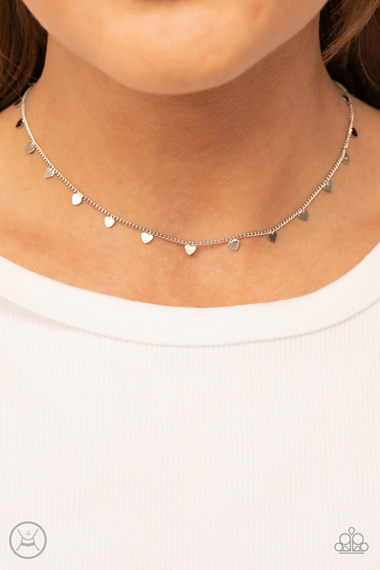 Cupids Cutest Valentine Silver Choker Necklace - Paparazzi Accessories  Dainty silver hearts dance from a dainty silver chain around the neck, creating a flirtatious fringe. Features an adjustable clasp closure.  Sold as one individual choker necklace. Includes one pair of matching earrings.