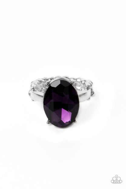 Updated Dazzle Purple Ring - Paparazzi Accessories  A stunning faceted plum gem, set in edgy pronged fittings, creates a glamorous show-stopping centerpiece atop sleek silver bands. Features a dainty stretchy band for a flexible fit.  Sold as one individual ring.