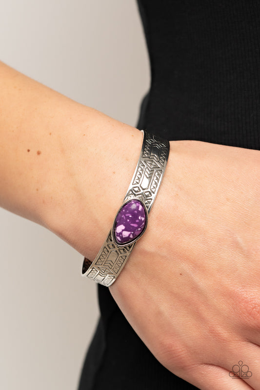 Gobi Glyphs Purple Cuff Bracelet - Paparazzi Accessories  Featuring a terrazzo finish, an asymmetrical purple stone is pressed into a silver cuff embossed in geometric texture for an artisanal finish.  Sold as one individual bracelet.