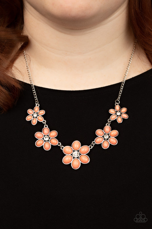 Prairie Party Orange Necklace - Paparazzi Accessories  Dotted with dainty white rhinestone centers, a flirtatious assortment of coral beaded flowers gradually increase in size as they link below the collar for a playful pop of color. Features an adjustable clasp closure.  Sold as one individual necklace. Includes one pair of matching earrings.