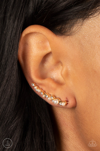 Couture Crawl Gold Ear Crawler Earring - Paparazzi Accessories  A bubbly assortment of dainty white rhinestones and white pearls gently climbs the ear for a timeless fashion statement. Features an extended post fitting that climbs the back of the ear and can be pressed together for a more secure fit.  Sold as one pair of ear crawlers.