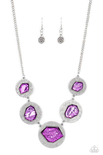Raw Charisma Purple Necklace - Paparazzi Accessories  Featuring a refracted shimmer, asymmetrical, glassy purple gems sparkle atop textured silver discs as they delicately link into an edgy statement piece below the collar. Features an adjustable clasp closure.  Sold as one individual necklace. Includes one pair of matching earrings.