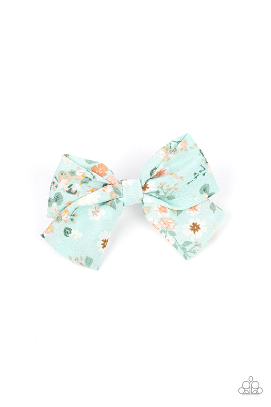 Wide Open Prairies Blue Hair Clip - Paparazzi Accessories  Printed in a vintage inspired floral pattern, a ribbon of blue crepe-like fabric delicately knots into a colorful bow for a country inspired finish. Features a standard hair clip on the back.  Sold as one individual hair clip.