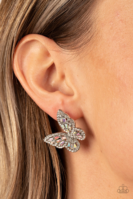 Smooth Like FLUTTER Multi Earring - Paparazzi Accessories  Bordered in dainty white rhinestones, emerald cut iridescent rhinestones sparkle inside the silver wings of a butterfly for an enchanting fashion. Earring attaches to a standard post fitting.  Sold as one pair of post earrings.