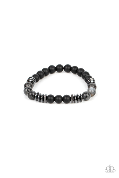Urban Therapy Black Beaded Bracelet - Paparazzi Accessories   Sections of polished black stones, shiny gunmetal accents, and speckled black stones are threaded along stretchy bands around the wrist for an earthy edge.  Sold as one individual bracelet.