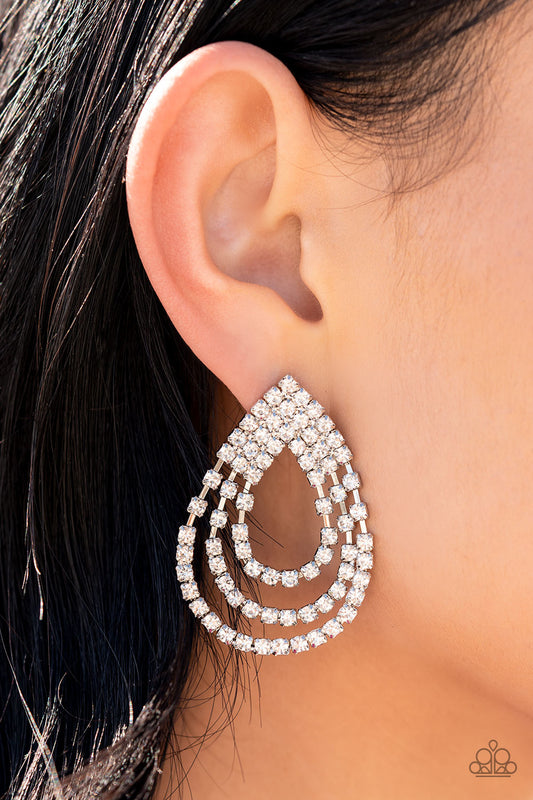 Take a POWER Stance White Post Earring - Paparazzi Accessories   Loops of glassy white rhinestones ripple out from the bottom of a stationary triangular fitting that is dotted in glittery white rhinestones, resulting in a timeless teardrop chandelier. Earring attaches to a standard post fitting.  Sold as one pair of post earrings.