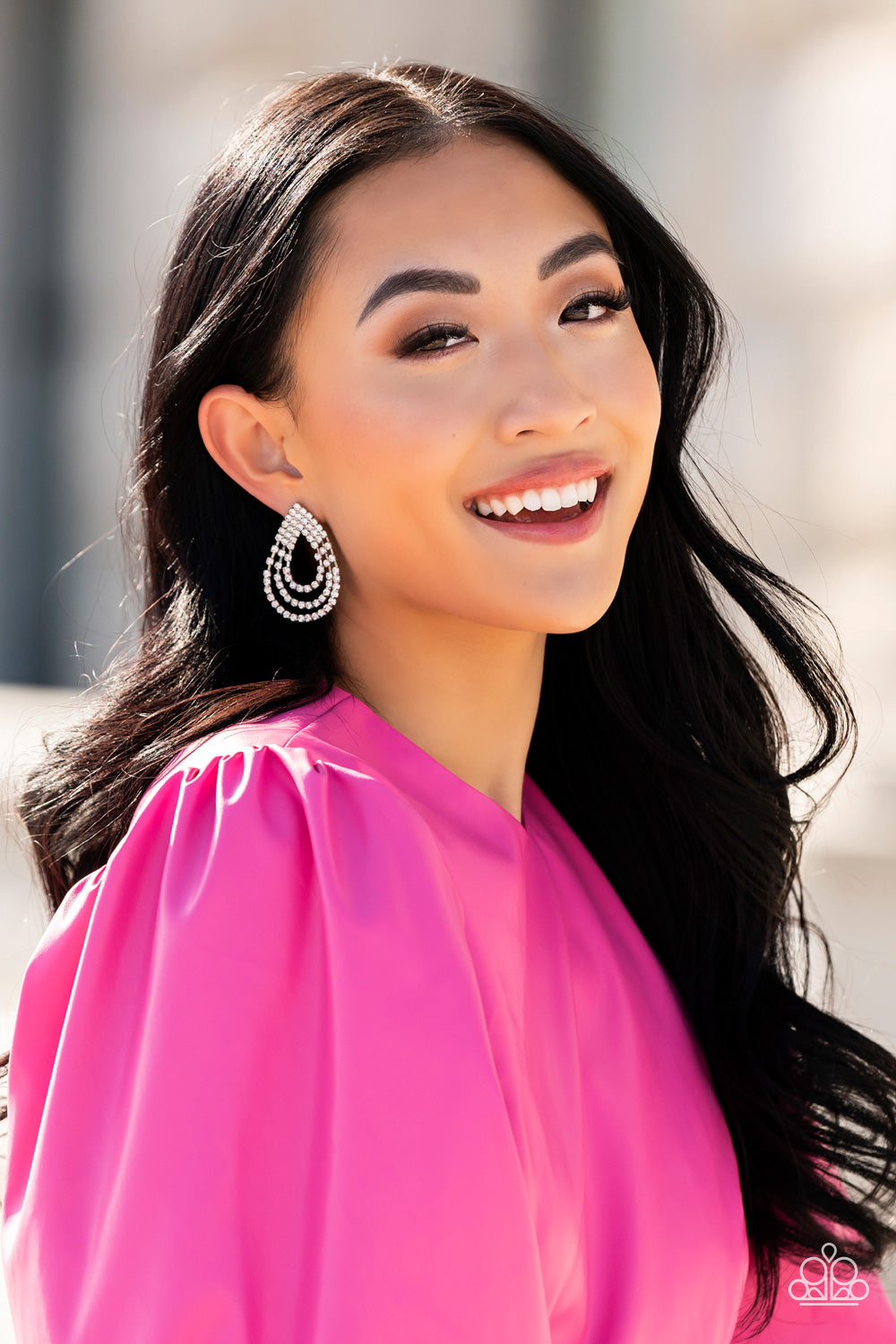 Take a POWER Stance White Post Earring - Paparazzi Accessories   Loops of glassy white rhinestones ripple out from the bottom of a stationary triangular fitting that is dotted in glittery white rhinestones, resulting in a timeless teardrop chandelier. Earring attaches to a standard post fitting.  Sold as one pair of post earrings.