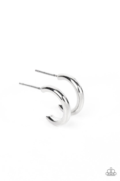 Small-Scale Shimmer Silver Hoop Earring - Paparazzi Accessories  A bold silver bar gently curves into a dainty hoop, creating a classic shimmer. Earring attaches to a standard post fitting. Hoop measures approximately 1/2" in diameter.  Sold as one pair of hoop earrings.