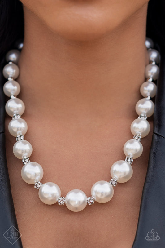 Sail Away with Me White Pearl Necklace - Paparazzi Accessories  Brilliant white rhinestone clusters and shiny silver beads accent a strand of lusciously oversized pearls, creating a stylish display below the collar. Features an adjustable clasp closure./p>  Sold as one individual necklace. Includes one pair of matching earrings.