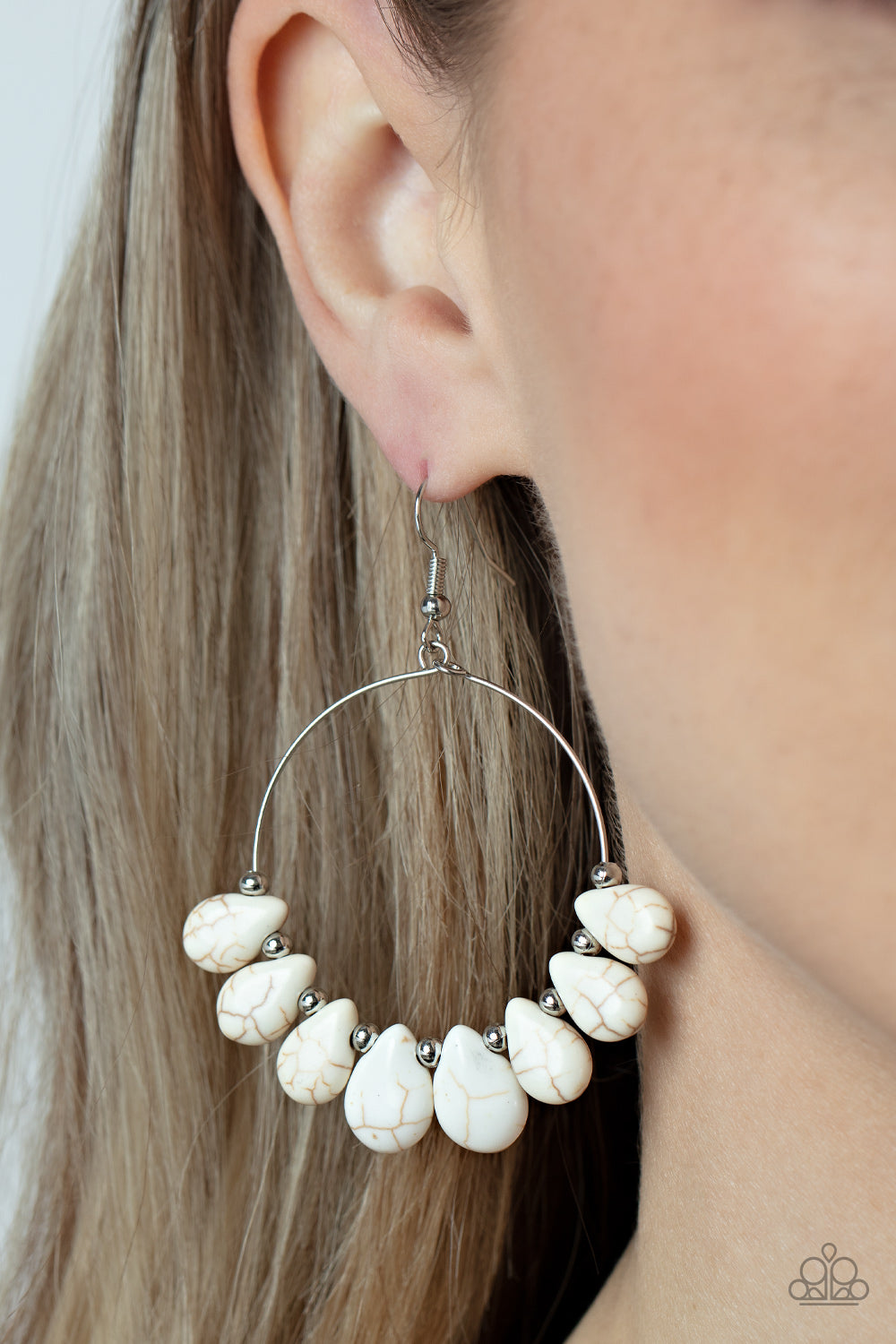 Canyon Quarry White Stone Earring - Paparazzi Accessories  Imperfect white teardrop stones alternate with dainty silver beads along a wire hoop, resulting in an adventurous fringe. Earring attaches to a standard fishhook fitting.  Sold as one pair of earrings.
