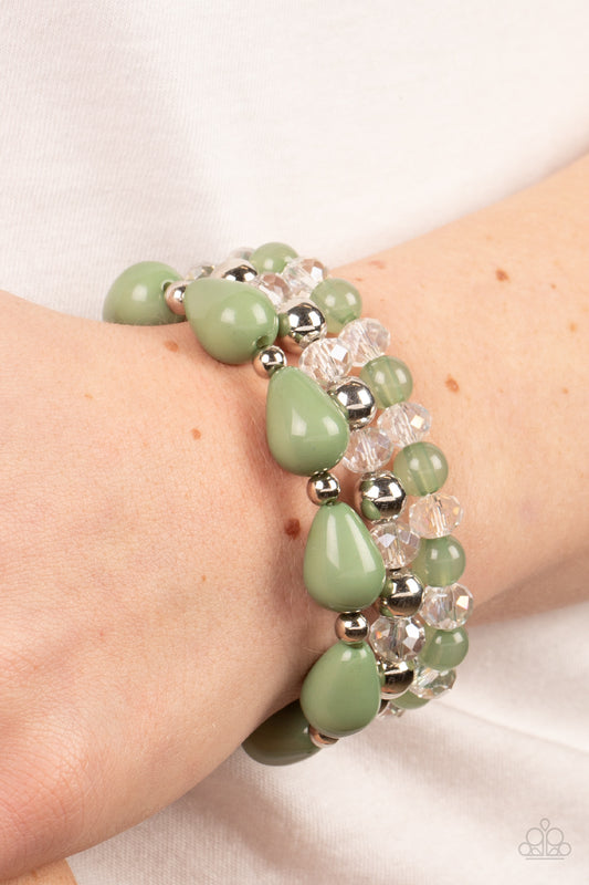 Beachside Brunch Green Bracelet - Paparazzi Accessories  A whimsical assortment of crystal-like beads, silver beads, opaque Basil beads, and Basil teardrop beads are threaded along stretchy bands around the wrist, resulting in colorful layers.  Sold as one set of three bracelets.