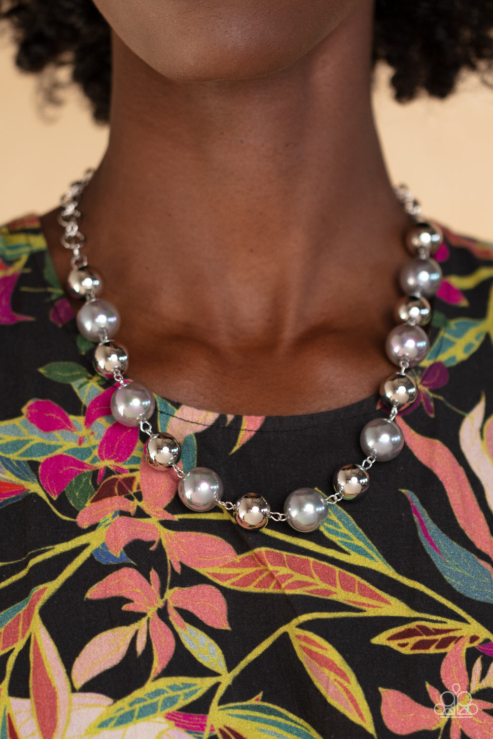 Dreamscape Escape - Silver Item #P2RE-SVXX-460IW Dipped in an iridescent finish, oversized silver pearls alternate with shiny silver beads below the collar for a dreamy pop of shimmer. Features an adjustable clasp closure.  Sold as one individual necklace. Includes one pair of matching earrings.  Get The Complete Look! Bracelet: "A DREAMSCAPE Come True - Silver" (Sold Separately)