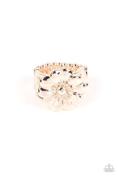 Floral Farmstead Rose Gold Ring - Paparazzi Accessories  Folds of heart shaped rose gold petals gather around a pronged and studded center, blooming into a whimsical floral centerpiece atop the finger. Features a stretchy band for a flexible fit.  Sold as one individual ring.