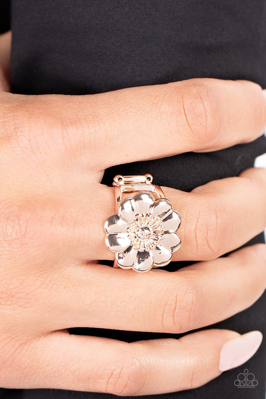 Floral Farmstead Rose Gold Ring - Paparazzi Accessories  Folds of heart shaped rose gold petals gather around a pronged and studded center, blooming into a whimsical floral centerpiece atop the finger. Features a stretchy band for a flexible fit.  Sold as one individual ring.