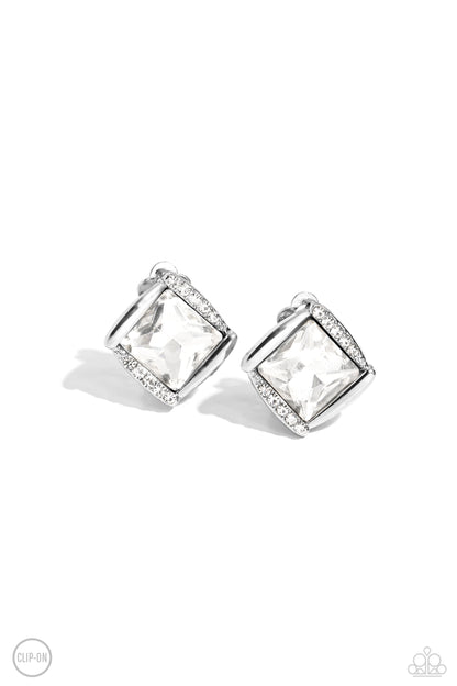 Sparkle Squared White Rhinestone Clip-On Earring - Paparazzi Accessories  Shiny silver bars gently overlap with white rhinestone encrusted silver bars around a square cut white rhinestone, resulting in a refined radiance. Earring attaches to a standard clip-on fitting.  Sold as one pair of clip-on earrings.  P5CO-WTXX-136XX