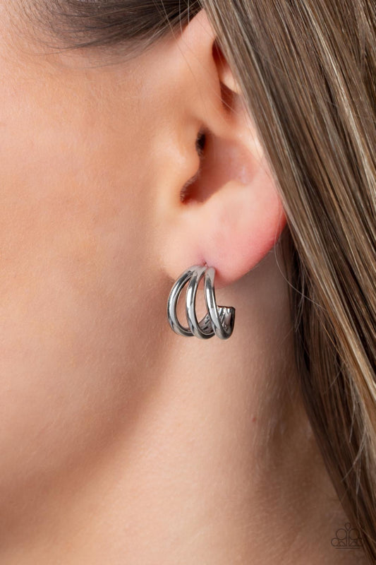 TRIPLE Down Silver Mini Hoop Earring - Paparazzi Accessories  Three dainty silver frames curve into a single hoop, creating a layered peek of shimmer. Earring attaches to a standard post fitting. Hoop measures approximately 1/2" in diameter.  Sold as one pair of hoop earrings.  P5HO-SVXX-333XX