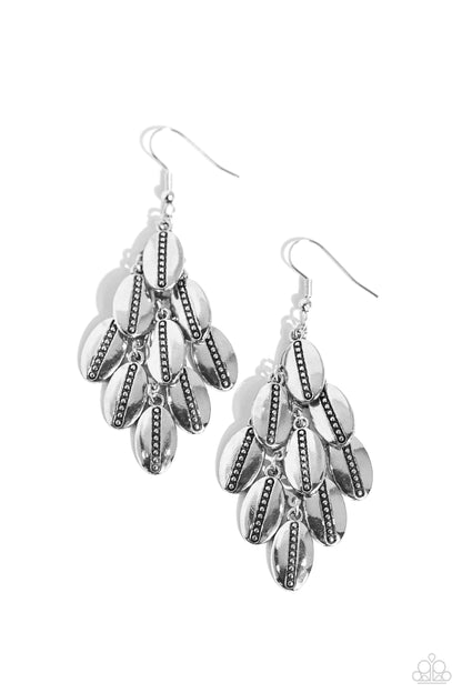 Tumbleweed Trek Silver Earring - Paparazzi Accessories  Dainty silver studs are pressed down the centers of oval silver frames that cascade from a silver netted backdrop, resulting in a rustic chandelier. Earring attaches to a standard fishhook fitting.  Sold as one pair of earrings.  P5ST-SVXX-050XX