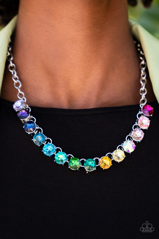 Rainbow Resplendence Multi Necklace - Paparazzi Accessories  Set in bold silver fittings, a rainbow of oversized multicolored rhinestones sparkles below the collar for an out-of-this-world statement. Features an adjustable clasp closure.  Sold as one individual necklace. Includes one pair of matching earrings.