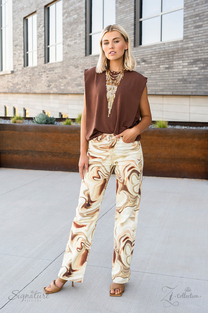 The Suz 2022 Zi Collection Necklace - Paparazzi Accessories  A seemingly infinite collection of dainty gold discs flickers and flashes as they catch the light, draping into four shimmery rows down the chest. Twinkly tassels of matching gold discs stream out from the bottom of the lowermost row, tapering into a hypnotic fringe that glints and glimmers, creating its own spotlight. Features an adjustable clasp closure.  Sold as one individual necklace. Includes one pair of matching earrings.