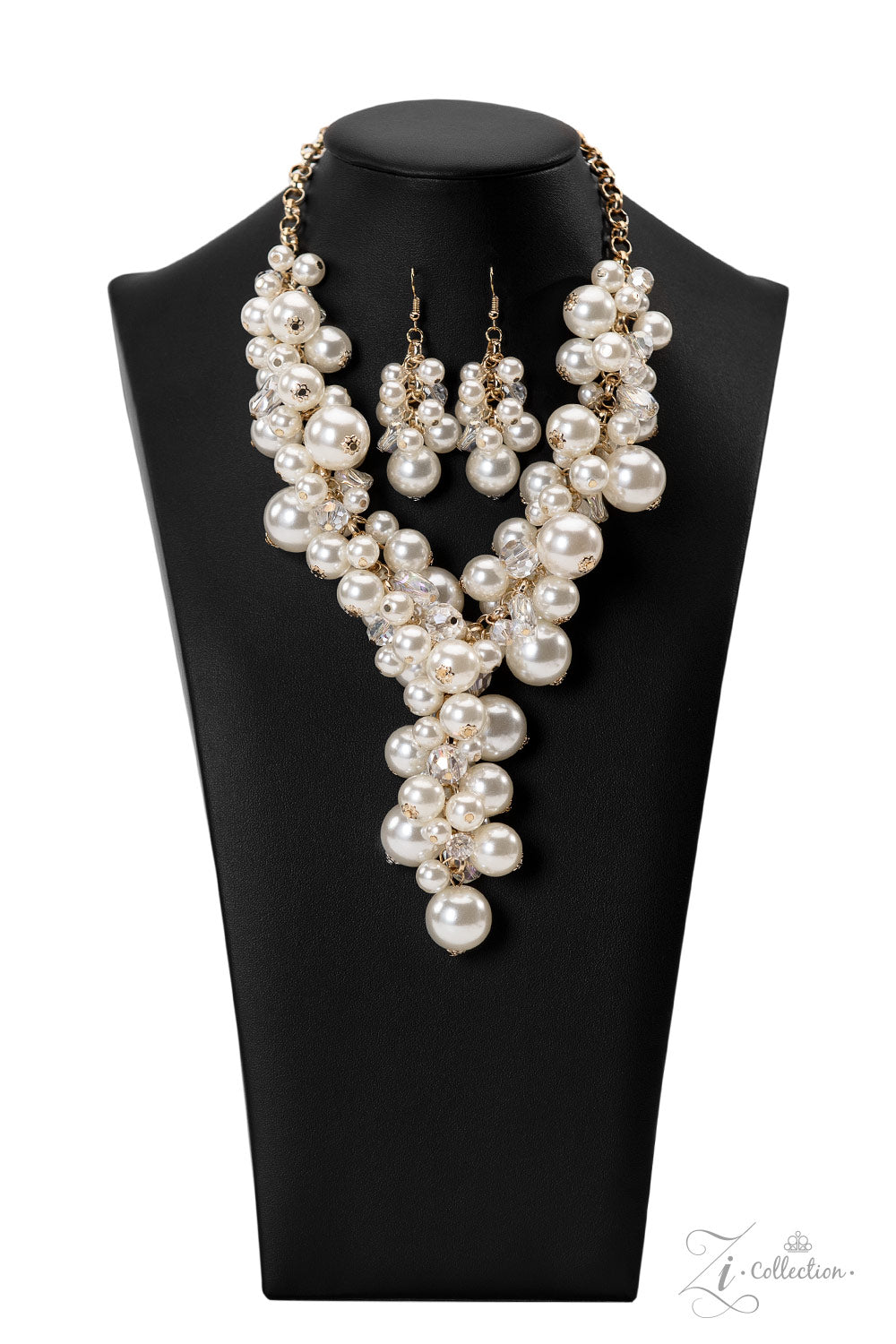 Imperfect glass-like beads and faceted clear beads are brushed in a hint of iridescence, allowing them to shimmer amongst an effervescent collection of classic and oversized white pearls. Dramatically clustered along a shiny gold chain, the bubbly display gives way to an extended tassel that emerges just below the collar, adding a timeless twist to its lustrous pearl palette. Features an adjustable clasp closure.