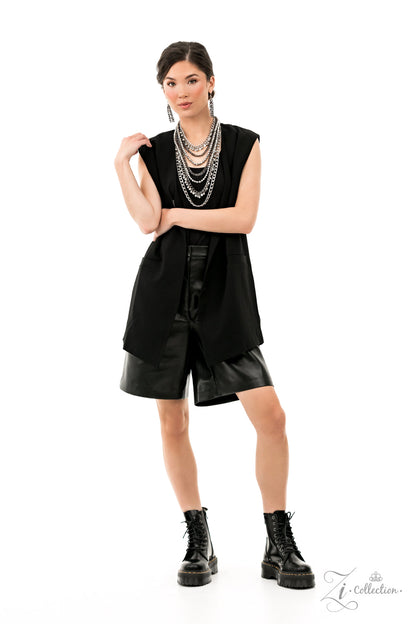 Featuring a range of oval and curb style links, a chaotic assortment of bulky silver and gunmetal chains fearlessly layers down the chest. Polished silver beads and textured silver discs swing from the thick curb chains, introducing audible shimmer to the intense industrial design. as two strands of high-sheen silver beads, chiseled into faceted metallic accents, drape between the mashup of tiered chains in a dramatic finish. Features an adjustable clasp closure.