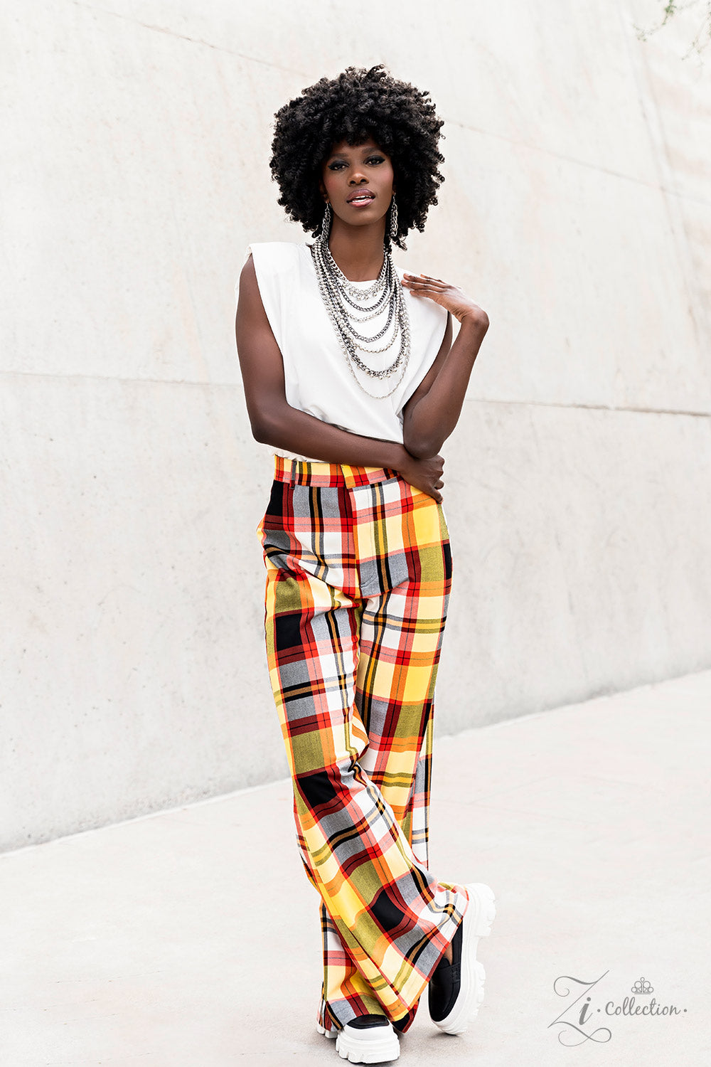 Featuring a range of oval and curb style links, a chaotic assortment of bulky silver and gunmetal chains fearlessly layers down the chest. Polished silver beads and textured silver discs swing from the thick curb chains, introducing audible shimmer to the intense industrial design. as two strands of high-sheen silver beads, chiseled into faceted metallic accents, drape between the mashup of tiered chains in a dramatic finish. Features an adjustable clasp closure.