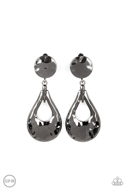 Metallic Magic Black Clip-On Earring - Paparazzi Accessories  A hammered gunmetal teardrop swings from the bottom of a hammered gunmetal disc, resulting in monochromatic magic. Earring attaches to a standard clip-on fitting.  Sold as one pair of clip-on earrings.