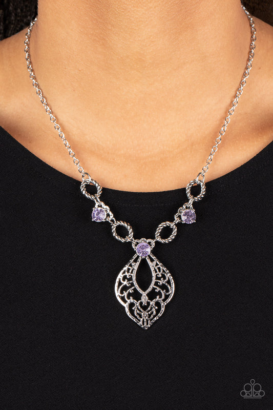 Contemporary Connections Purple Necklace - Paparazzi Accessories  Twisted silver links and oversized purple rhinestones delicately alternate below the collar. A hammered filigree filled silver pendant shimmers from the bottom of the centermost rhinestone, creating a contemporary pendant. Features an adjustable clasp closure.  Sold as one individual necklace. Includes one pair of matching earrings.