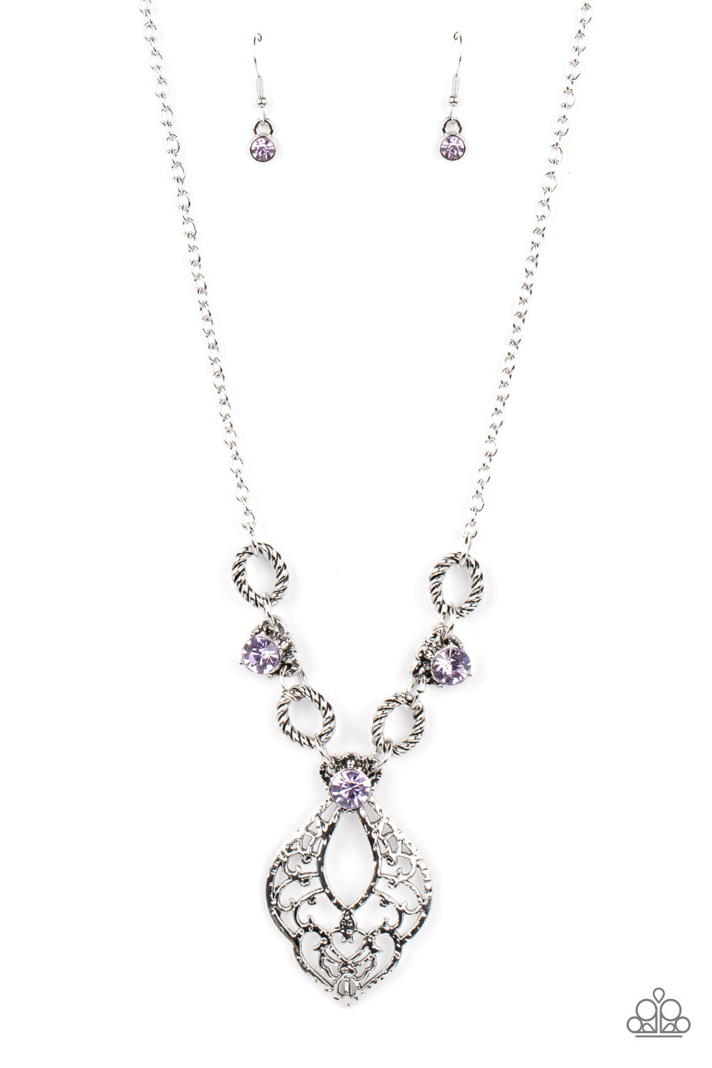 Contemporary Connections Purple Necklace - Paparazzi Accessories  Twisted silver links and oversized purple rhinestones delicately alternate below the collar. A hammered filigree filled silver pendant shimmers from the bottom of the centermost rhinestone, creating a contemporary pendant. Features an adjustable clasp closure.  Sold as one individual necklace. Includes one pair of matching earrings.