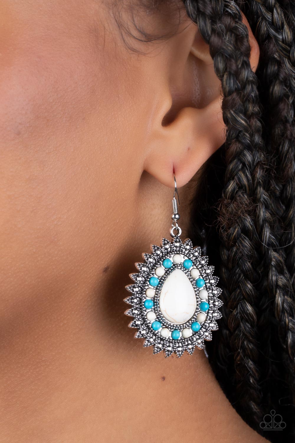 Sagebrush Sabbatical White Earring - Paparazzi Accessories  Dainty turquoise and white stones encircle an oversized white teardrop stone atop a studded silver backdrop. Studded silver petals flare out from the teardrop frame, adding authentic texture to the seasonal centerpiece. Earring attaches to a standard fishhook fitting.  Featured inside The Preview at GLOW!  Sold as one pair of earrings.